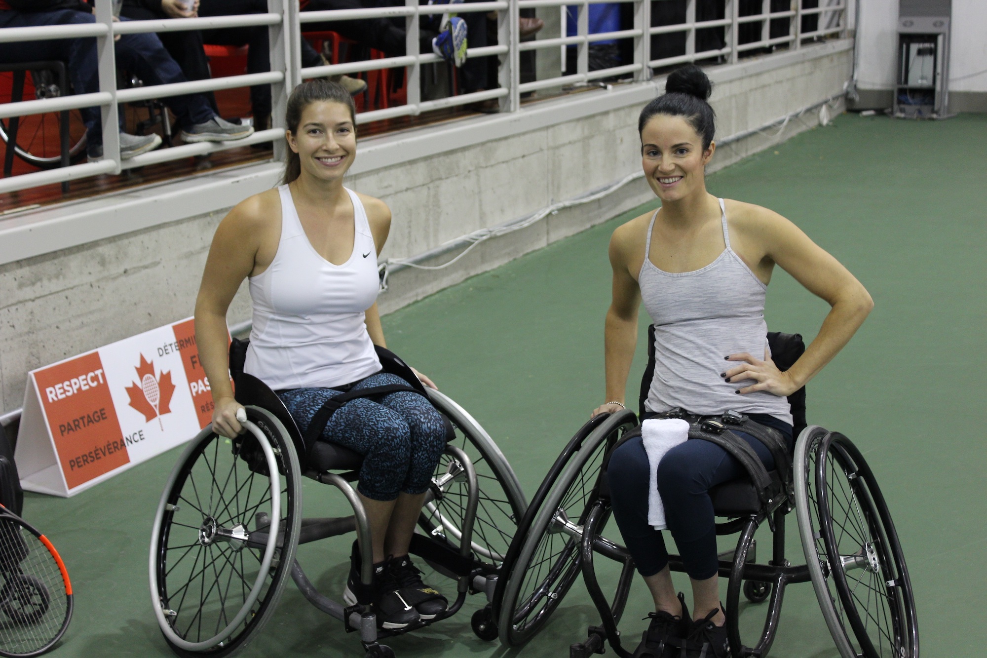 two wheelchair players smiling