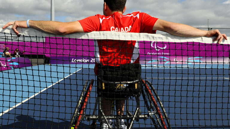 Wheelchair tennis player on court