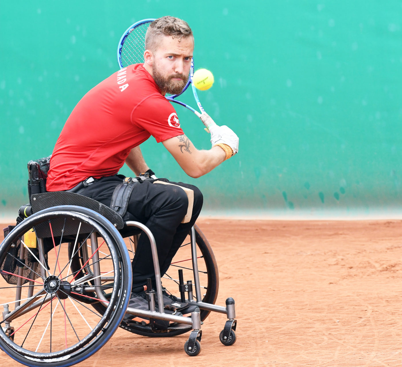 rob shaw plays wheelchair tennis in lima