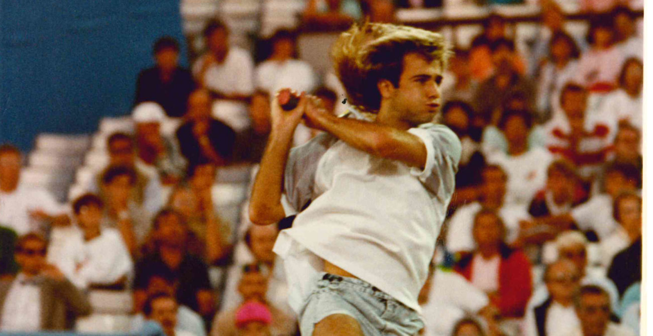 Andre Agassi hits a backhand