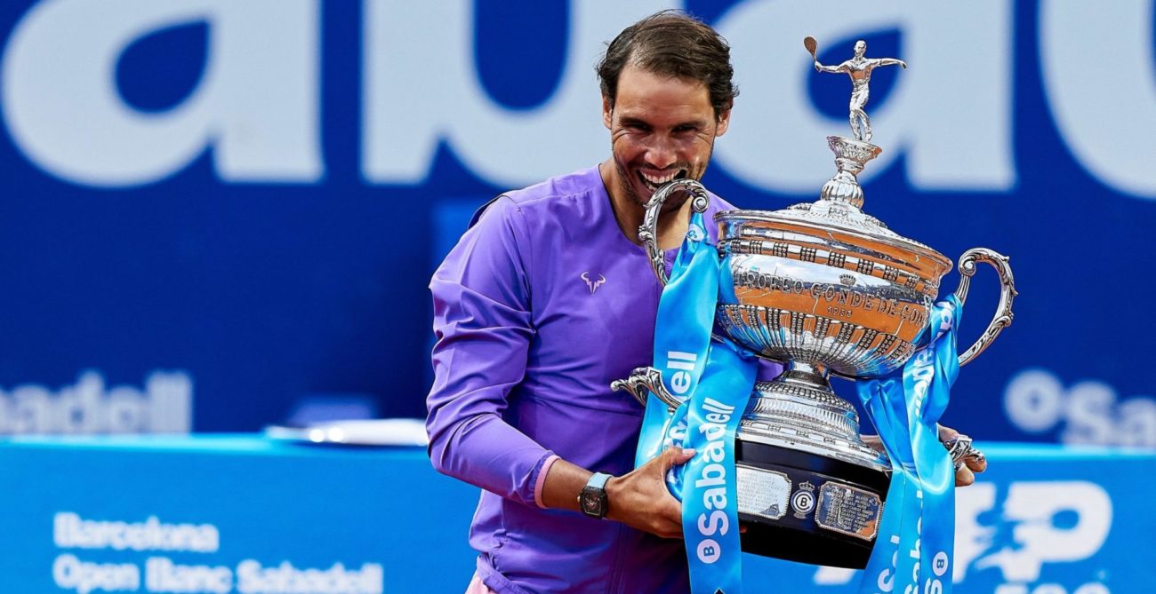 nadal holds the barcelona open trophy