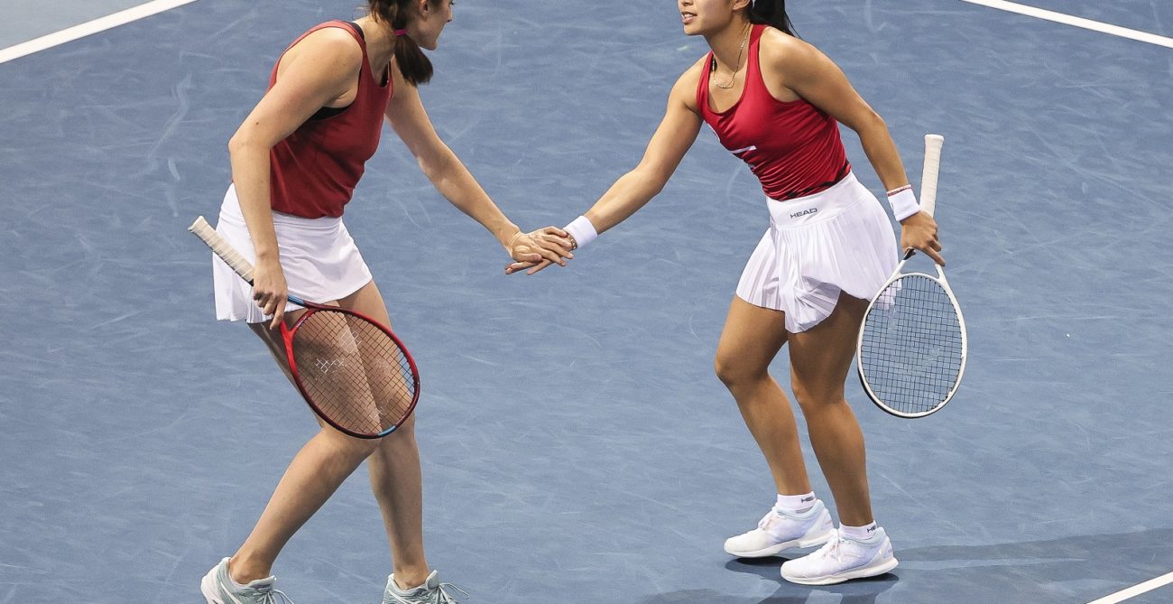 Rebecca Marino and Carol Zhao encourage each other during the billie jean king doubles match
