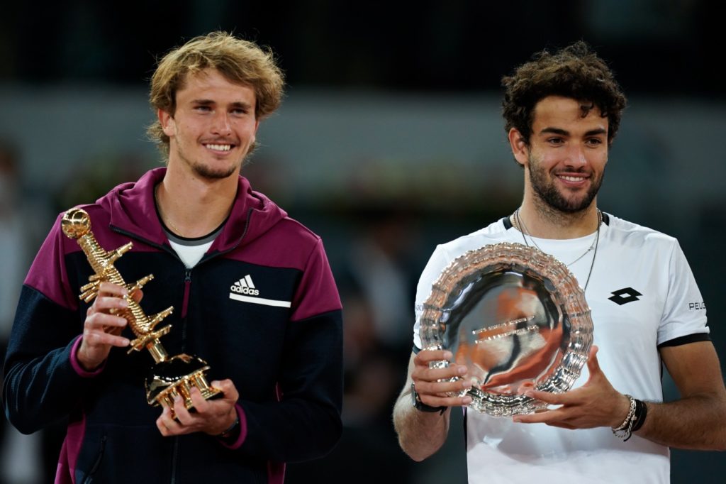 Zverev and Berrettini hold the Madrid trophy and runner up plate, respectively