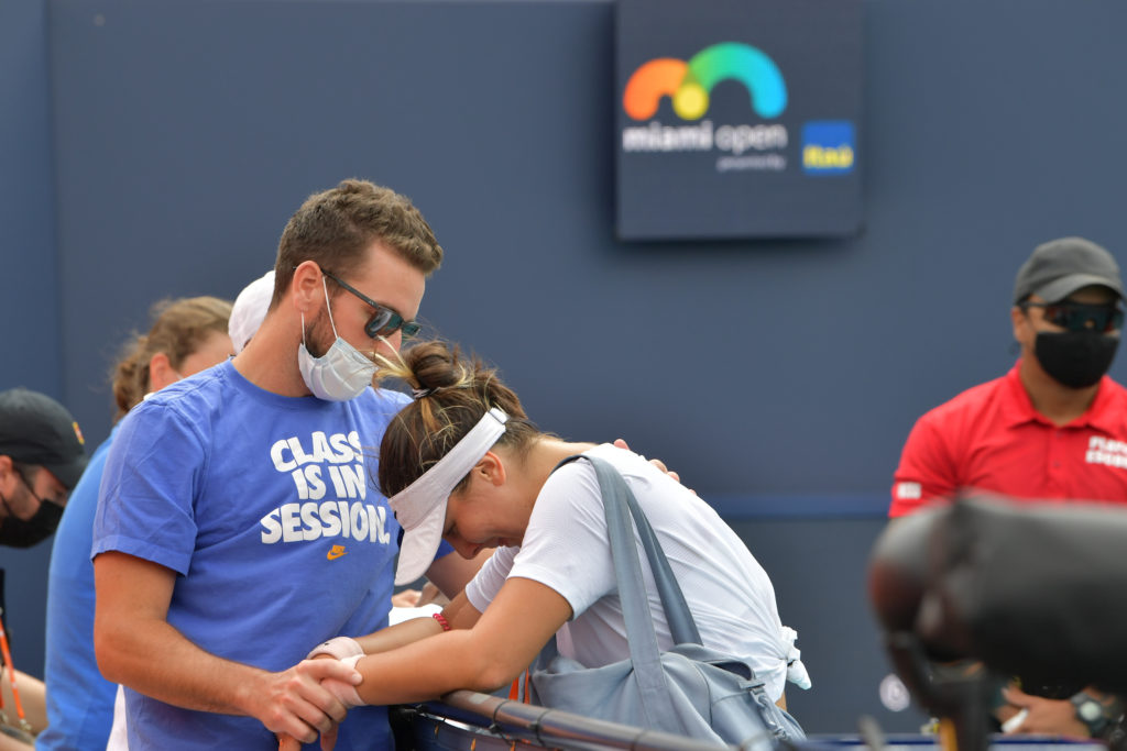Andreescu with her head down, looking disappointed after her final in Miami