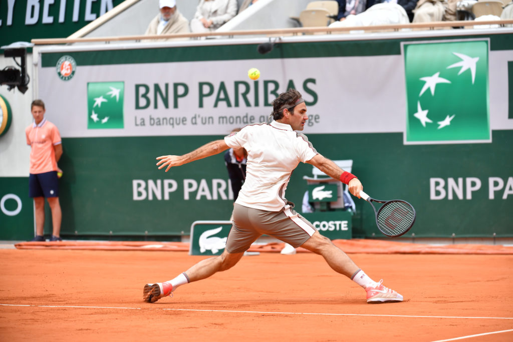 Federer slides to his backhand at Roland Garros