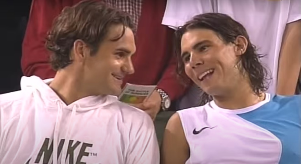 Nadal and Federer laughing after a match