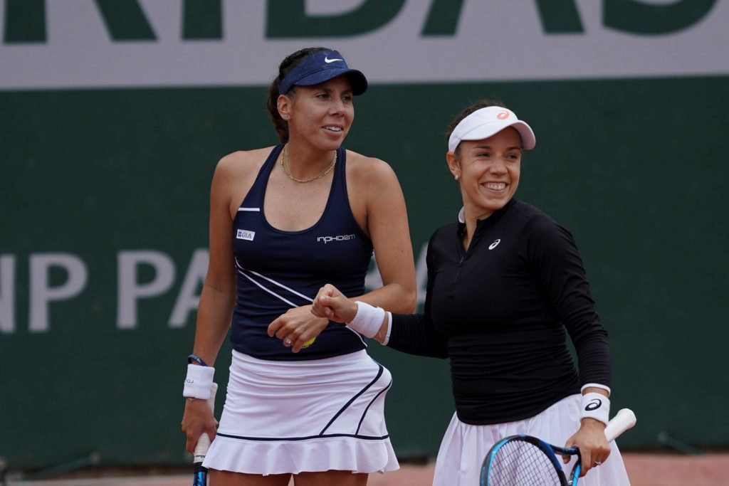 Sharon Fichman and Giuliana Olmos smile during their match