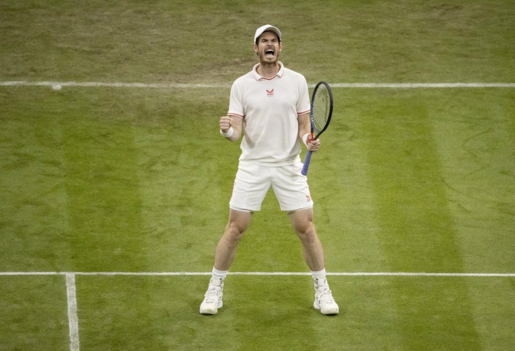 Andy Murray screams in celebration after winning a point at Wimbledon