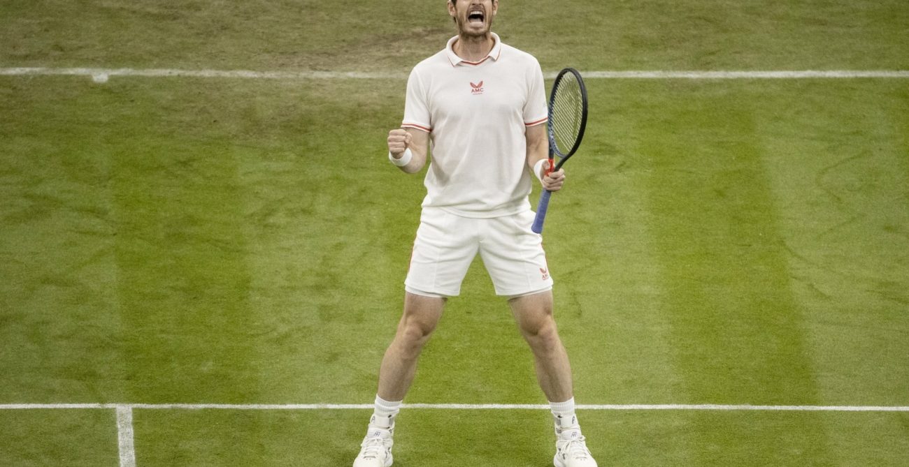 Andy Murray screams in celebration after winning a point at Wimbledon