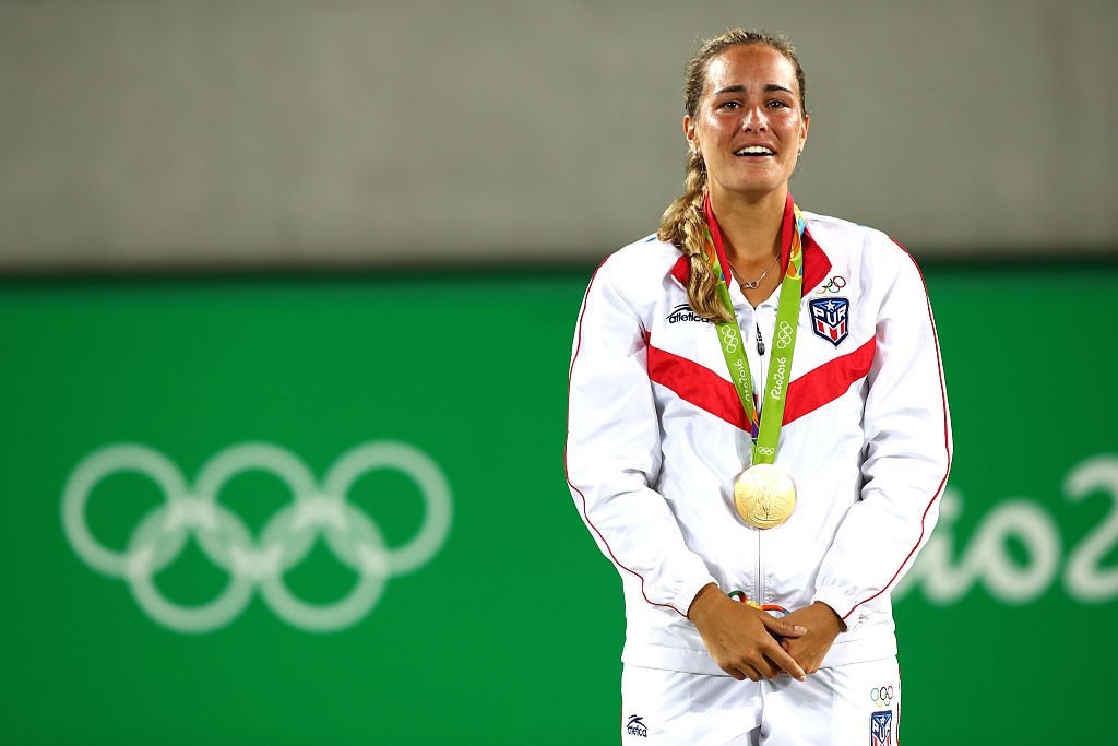 Monica Puig stands with her Olympic Gold Medal during the Rio Olympics