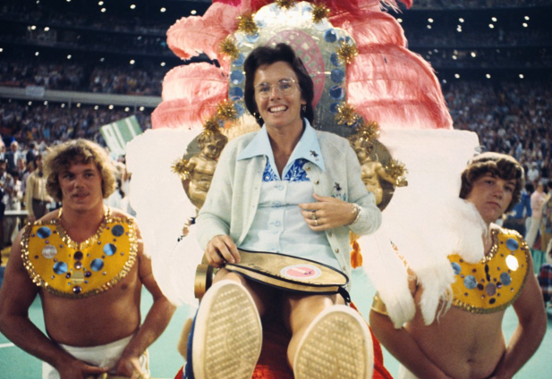 Billie Jean King is carried onto the court for the Battle of the Sexes.