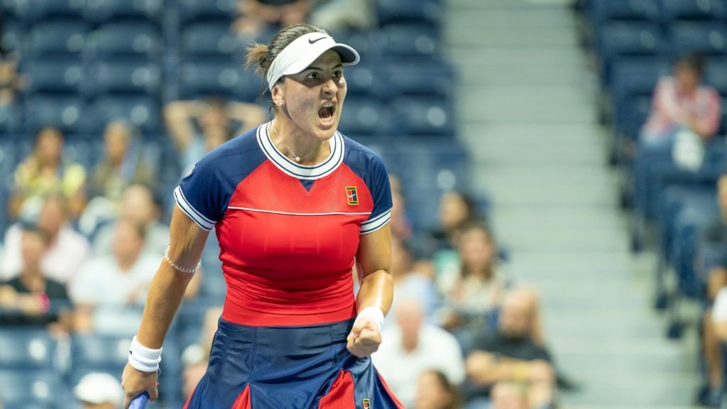 Bianca Andreescu pumps her fist and yells.