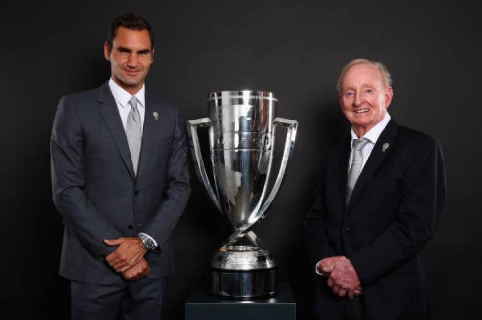 Roger Federer and Laver Cup by the Laver Cup trophy