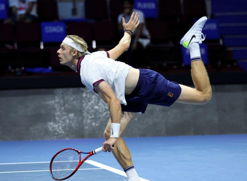 Denis Shapovalov lands at the end of his service.