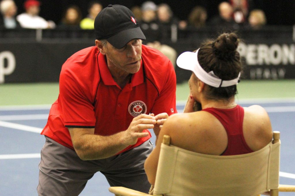 Sylvain Bruneau coaching Bianca at the Fed Cup