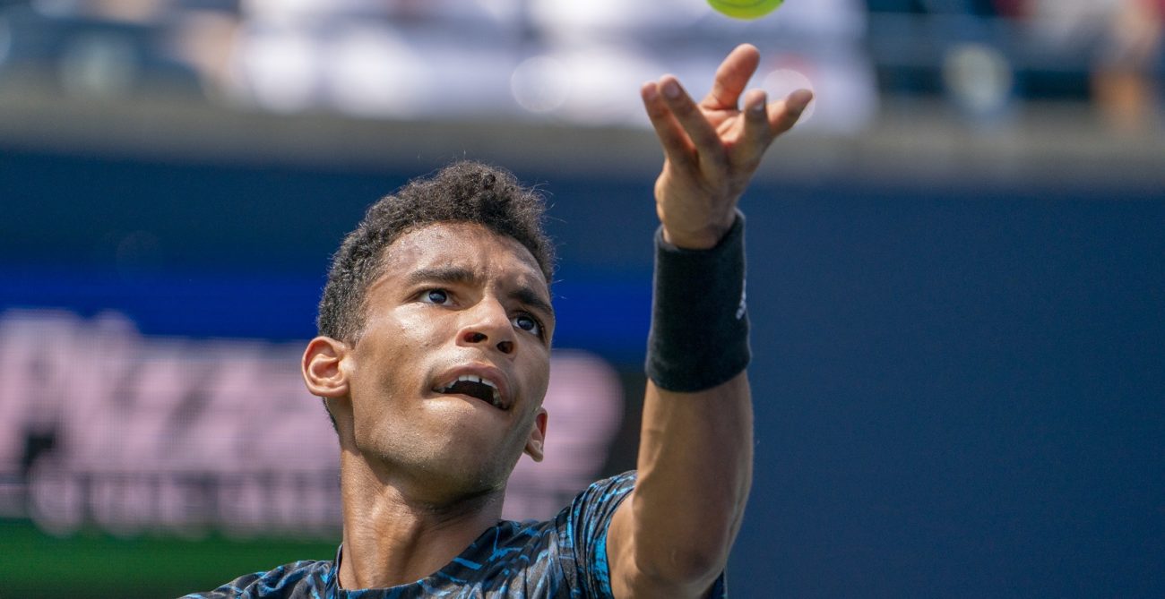 Felix Auger-Aliassime serves at the 2021 National Bank Open