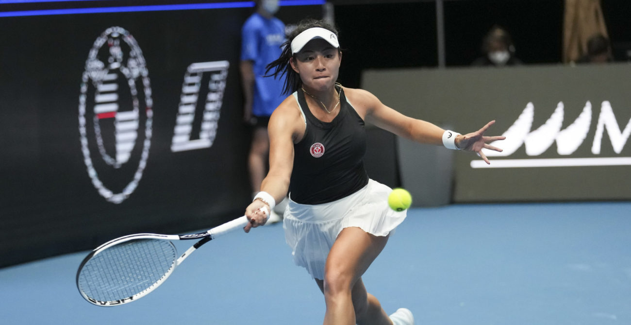 Carol Zhao reaches for a forehand.