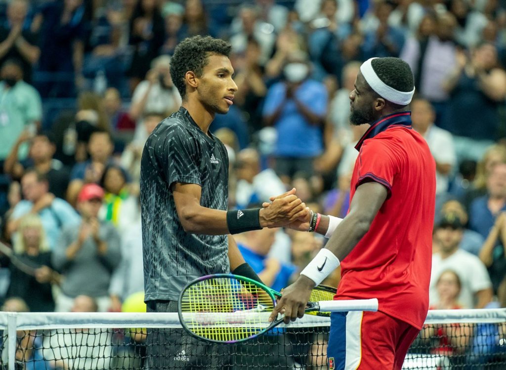 Felix shakes hands with Frances Tiafoe at the US Open 2021
