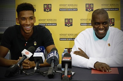 Félix Auger-Aliassime and his father Sam sit at press conference
