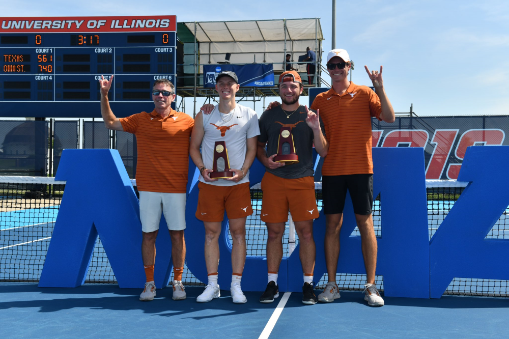 cleeve harper holds doubles trophy ncaa