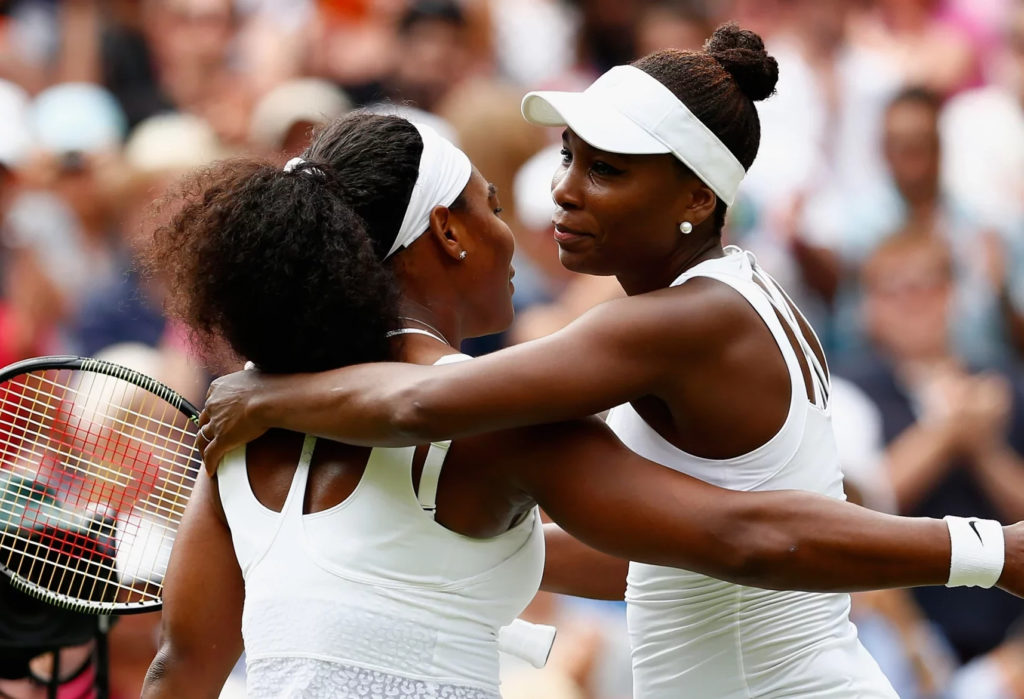 Serena and Venus hugging