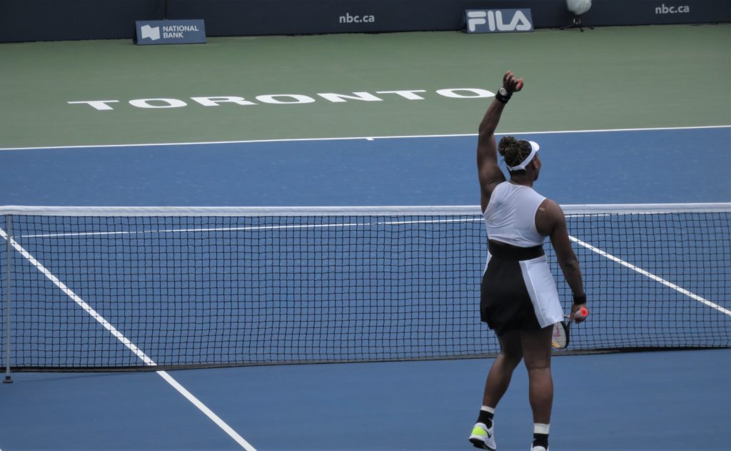 Serena Williams waves to the crown