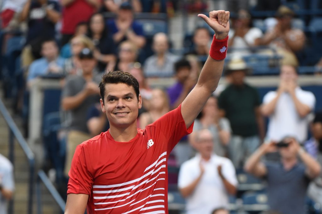 Milos smiles and gives a thumbs up to the crowd in Toronto