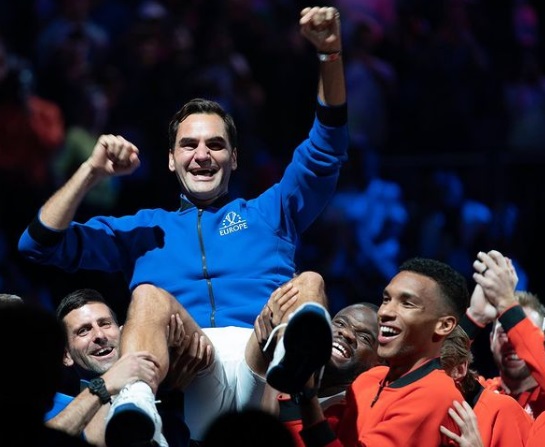 Roger Federer carried by fellow ATP players at the Laver Cup following his last ever professional match