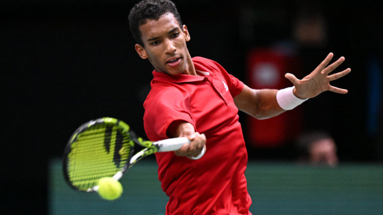 Auger-Aliassime hits forehand