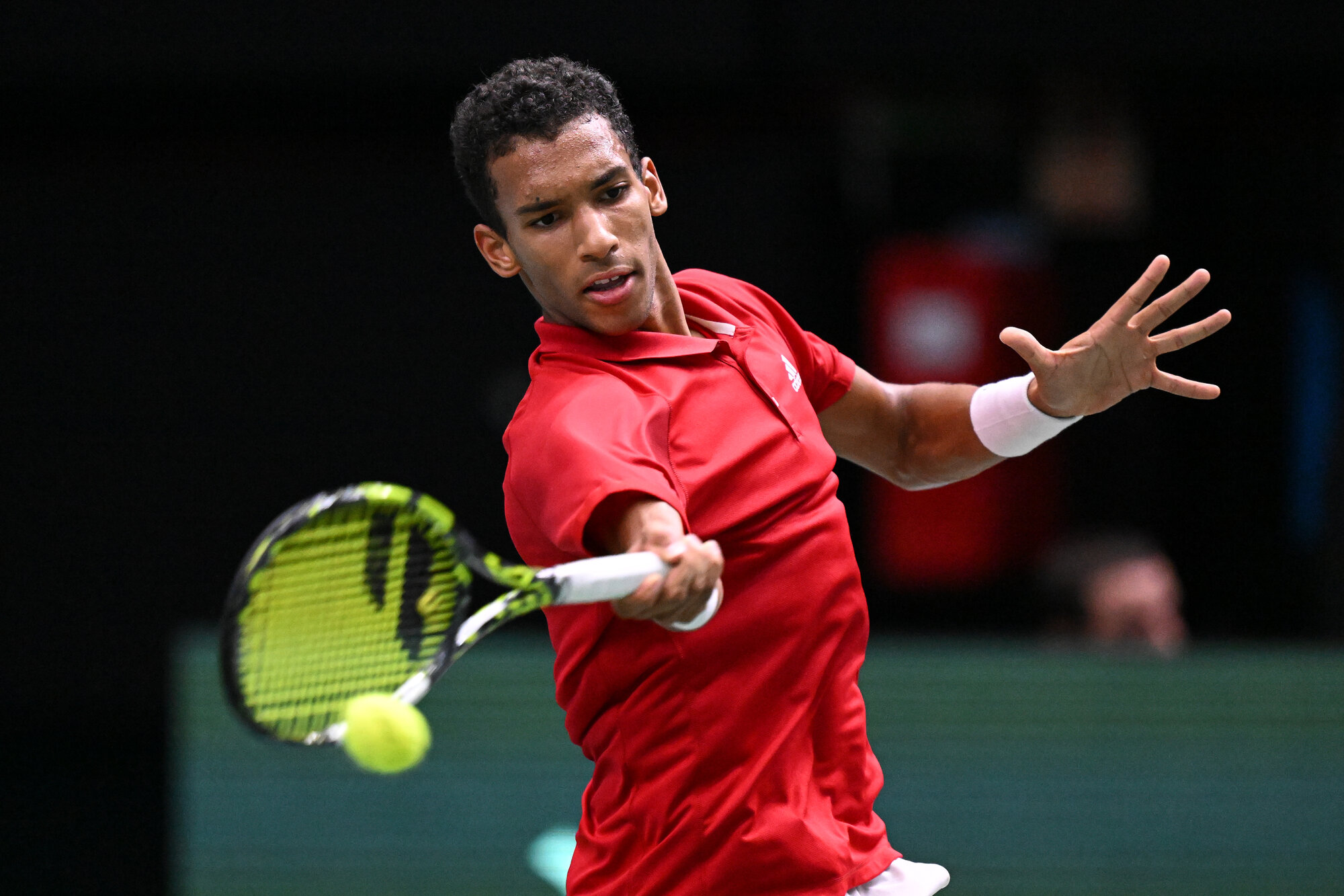 Auger-Aliassime hits forehand