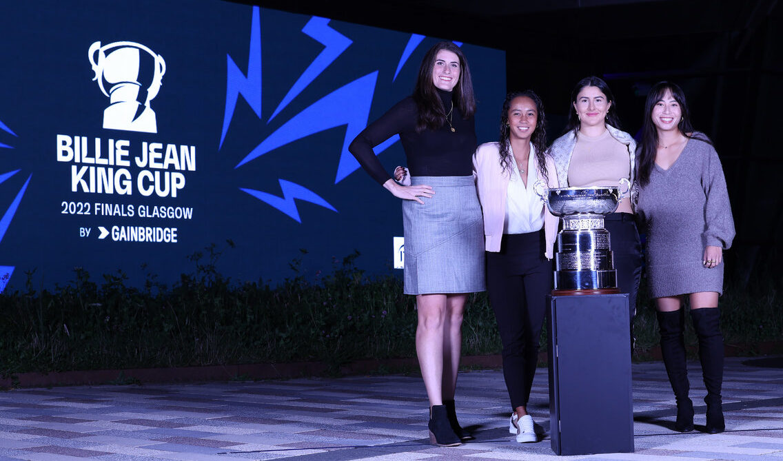 Team Canada at the Billie Jean King Cup Gala in front of trophy