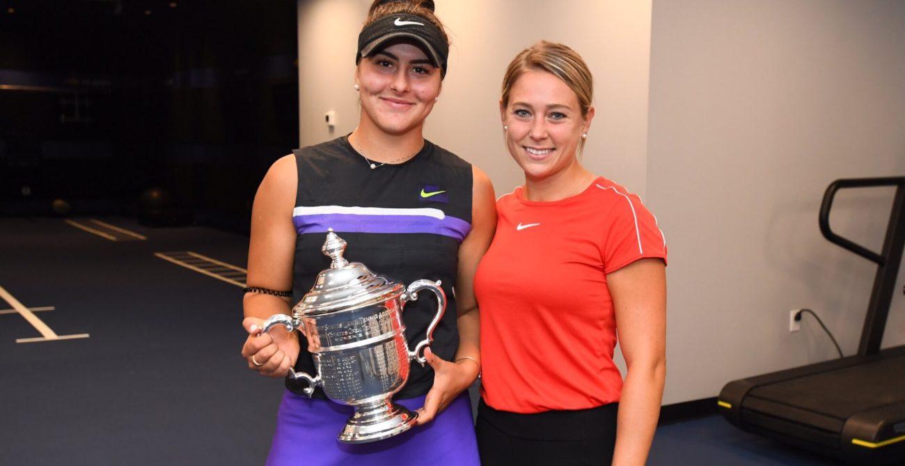 Bianca Andreescu (left) holds the US Open trophy next to Virginie Tremblay