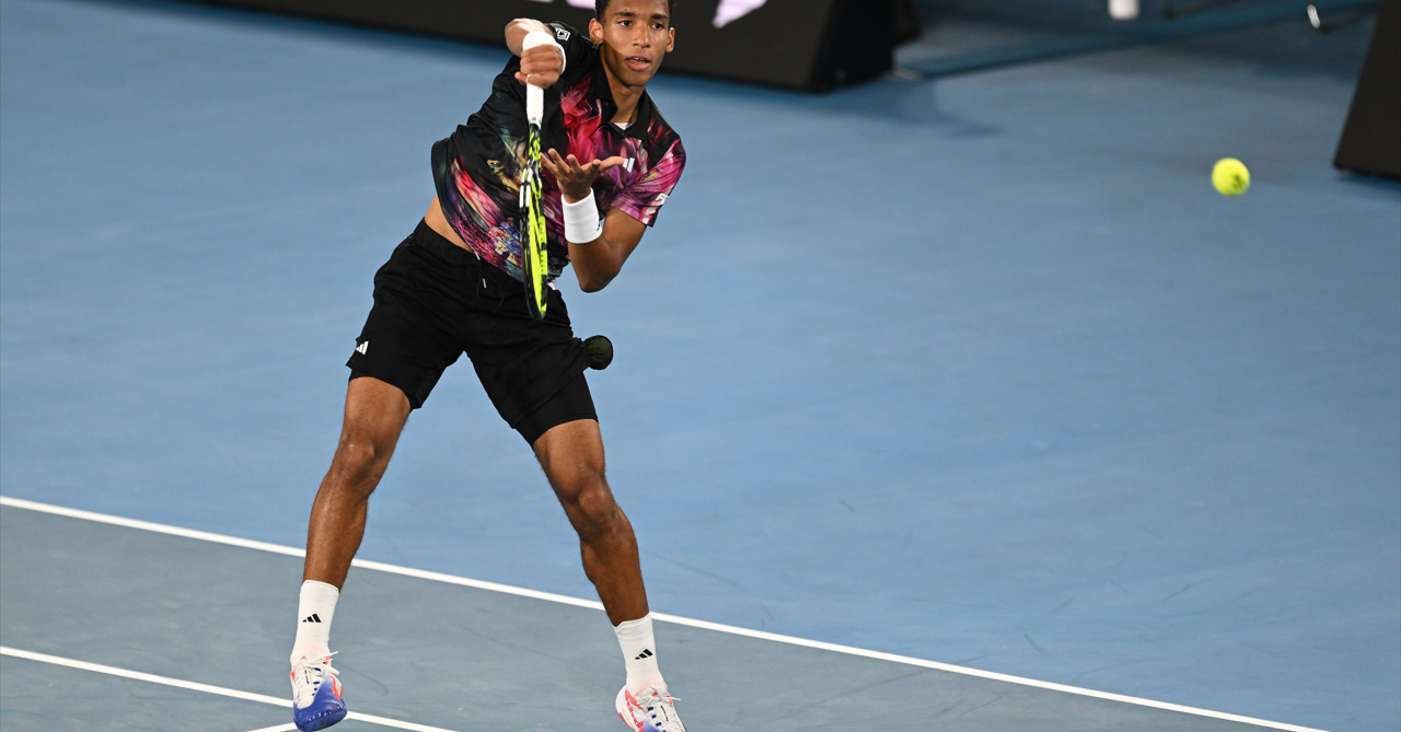 auger-aliassime leaps volley at Australian Open