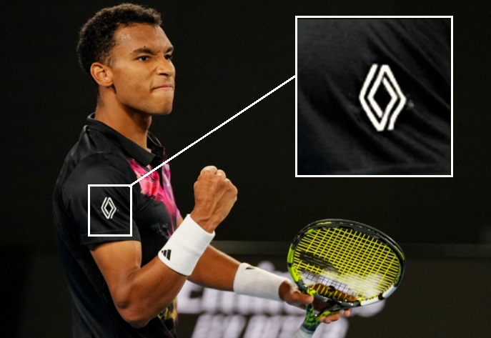 Felix Auger-Aliassime with Renault logo on shirt