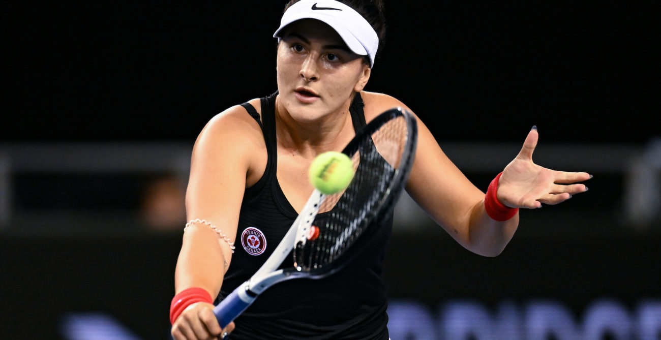 Bianca Andreescu hits a backhand volley.