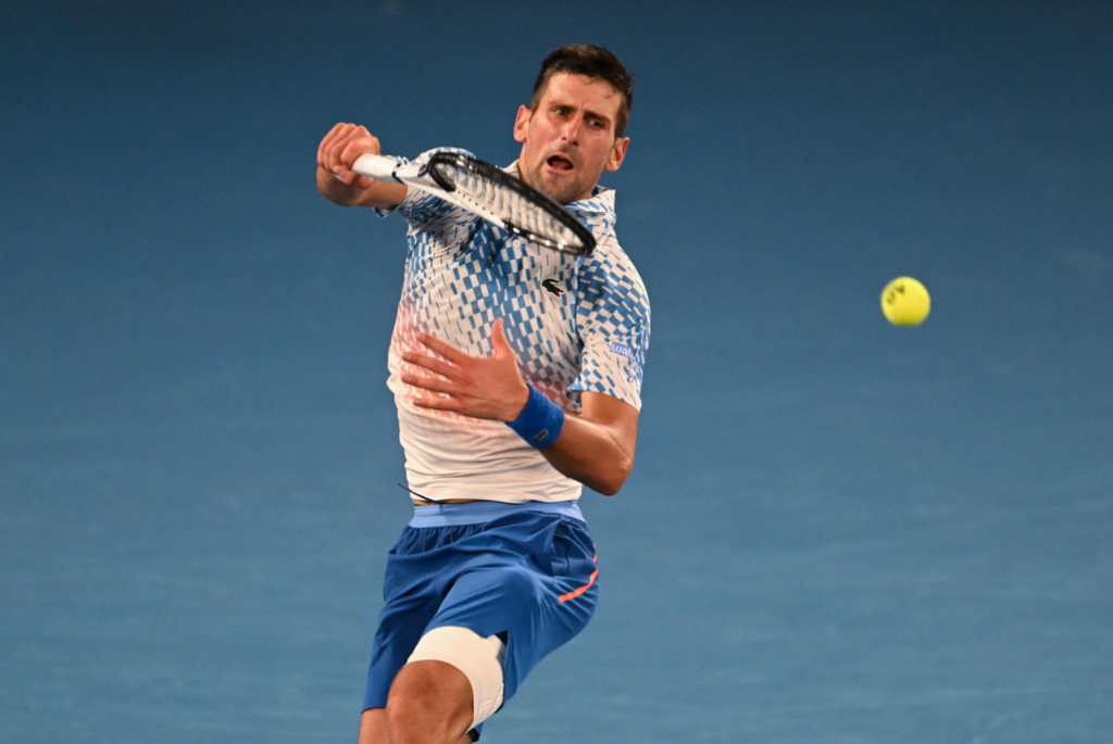Novak Djokovic follows through on a smash.