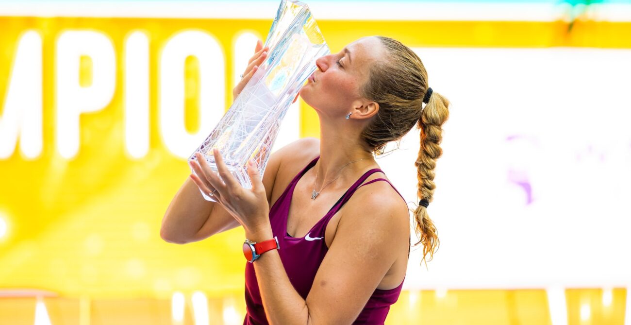 Petra Kvitova kisses the Miami trophy.