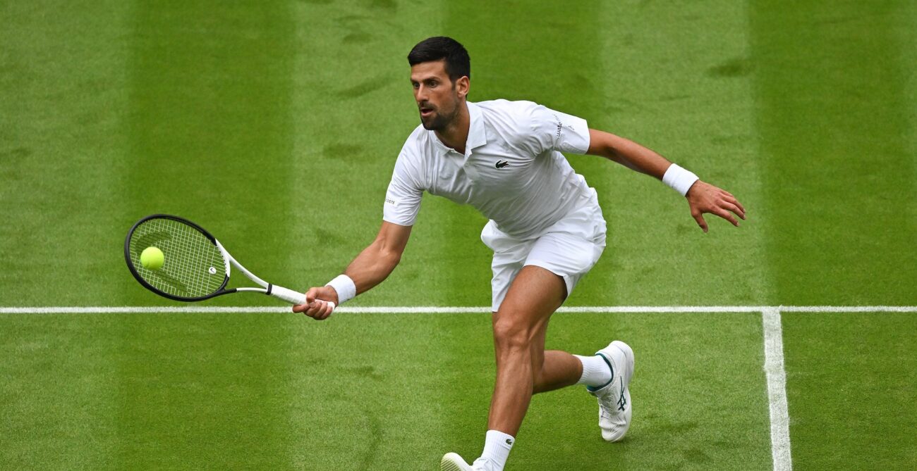 Novak Djokovic hits a forehand volley.