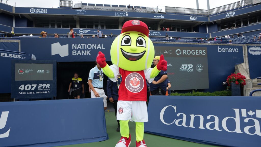 The Tennis Canada Mascot walks out onto Centre Court.