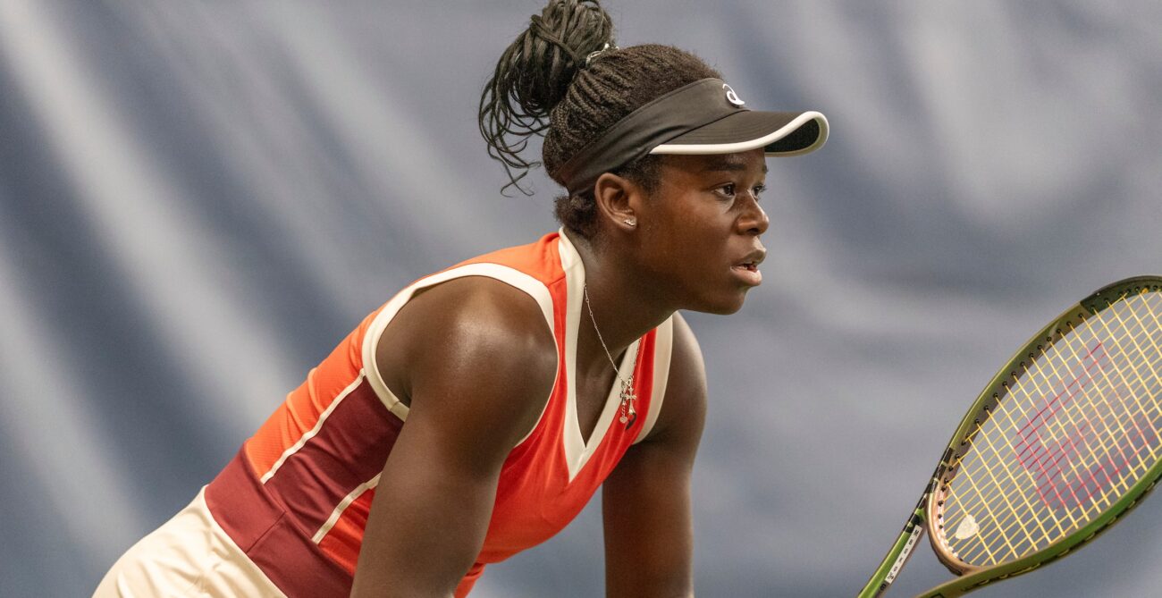 Victoria Mboko readies herself to play tennis