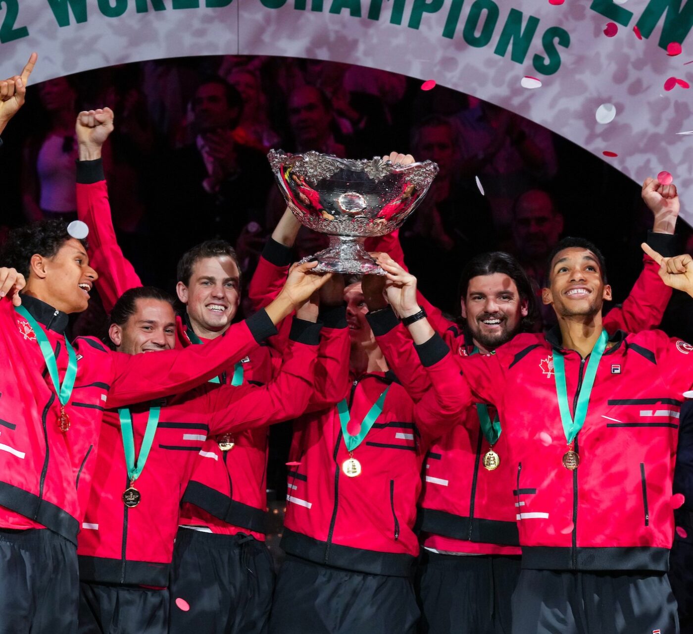 Team Canada lifts the Davis Cup trophy after winning it in 2022.