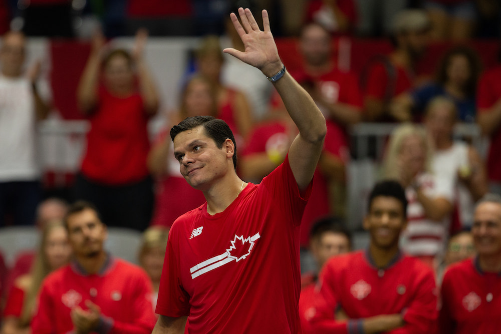 Milos Raonic waves to the crowd at the Davis Cup.