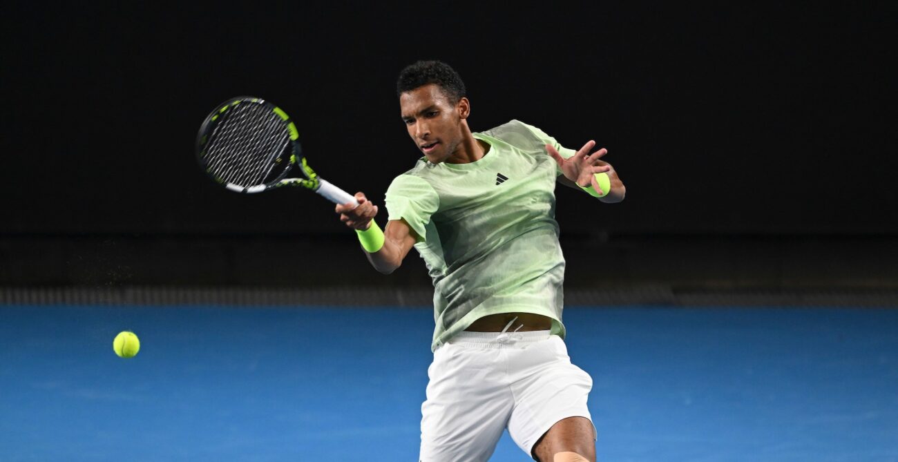 Felix Auger-Aliassime hits a forehand during his loss to Daniil Medvedev at the Australian Open.