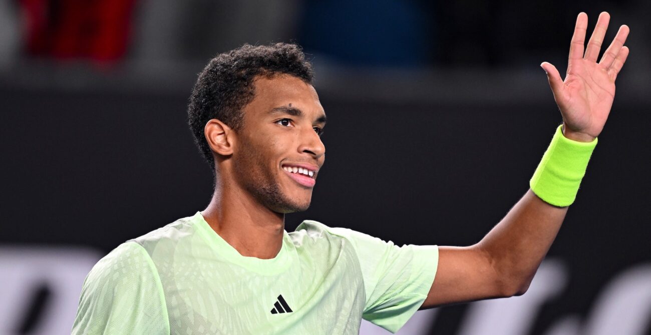 Felix Auger-Aliassime waves to the crowd. He advanced to the Montpellier semifinals with a win on Friday.