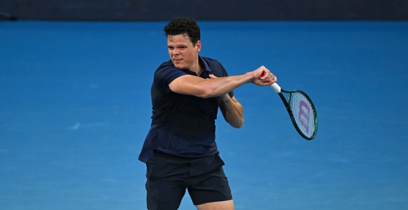 Milos Raonic follows through on a forehand. He lost to Jannik Sinner in Rotterdam.
