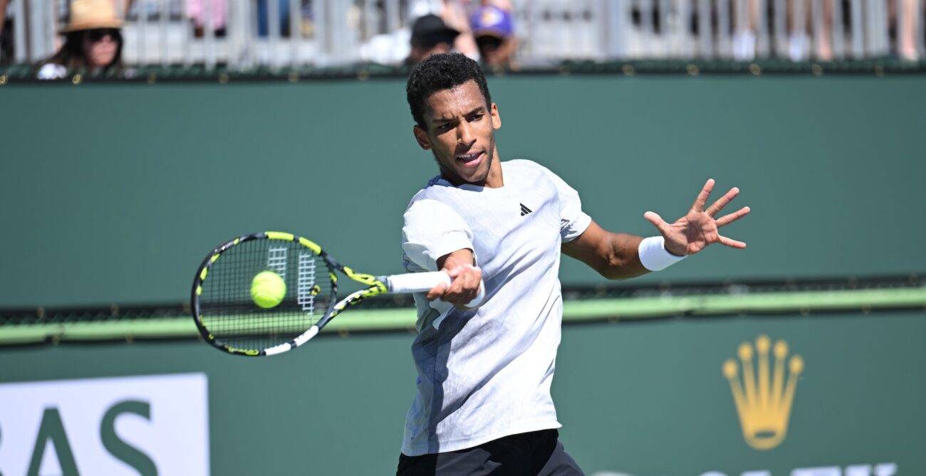 Felix Auger-Aliassime hits a forehand. He won Thursday at the Miami Open.