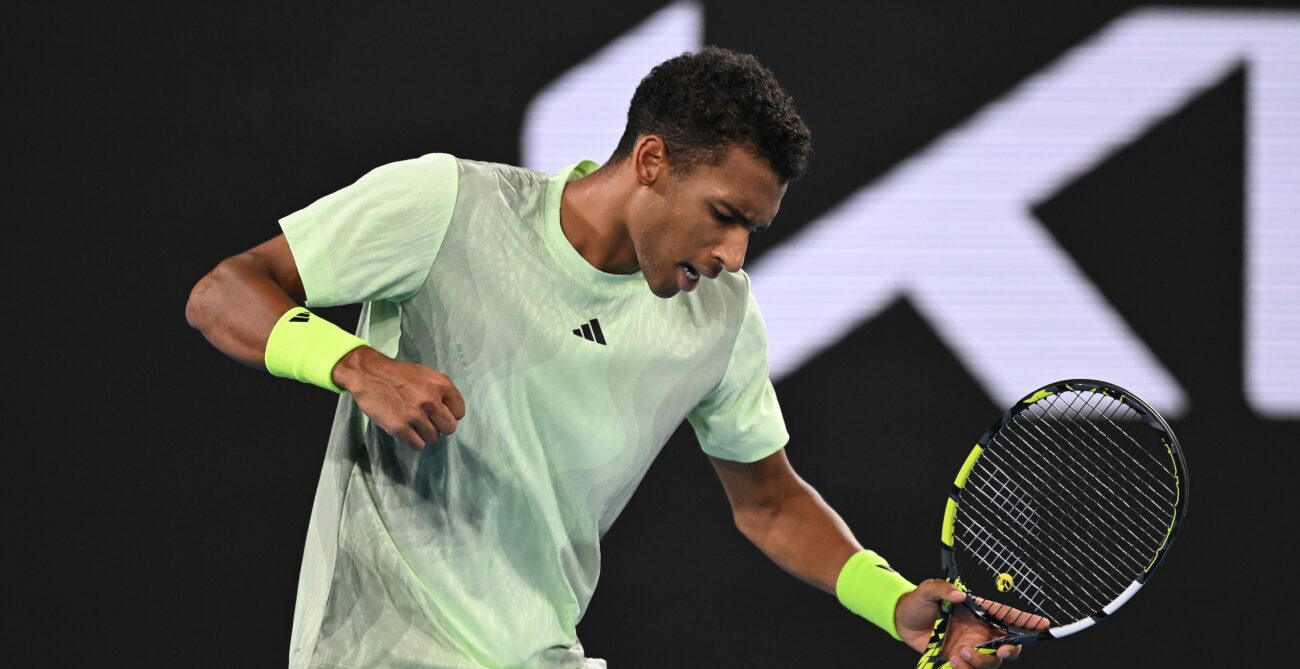 Felix Auger-Aliassime winds up to pump his fist. He won his opening match in Indian Wells over Constant Lestienne.