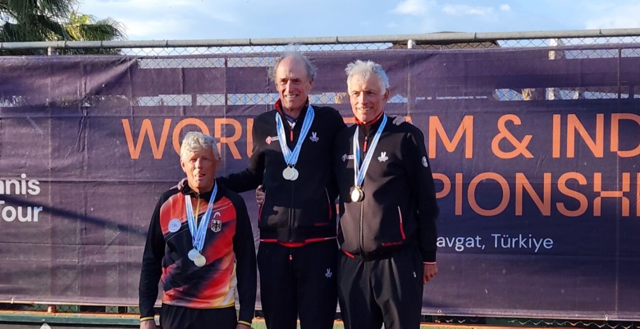 Chris Burr and Tim Griffin stand atop the podium at the Masters World Championships. They won gold this week as Thomas Venos won a wheelchair ITF title.