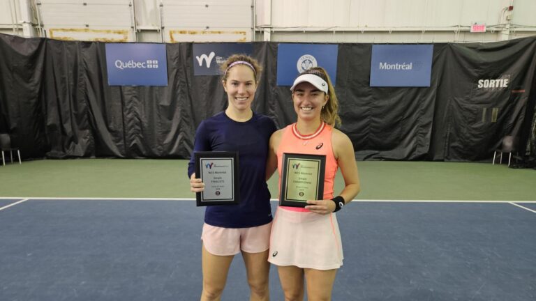 Jessica Failla (right) and Jessie Aney hold up their plaques at the ITF event in Montreal.
