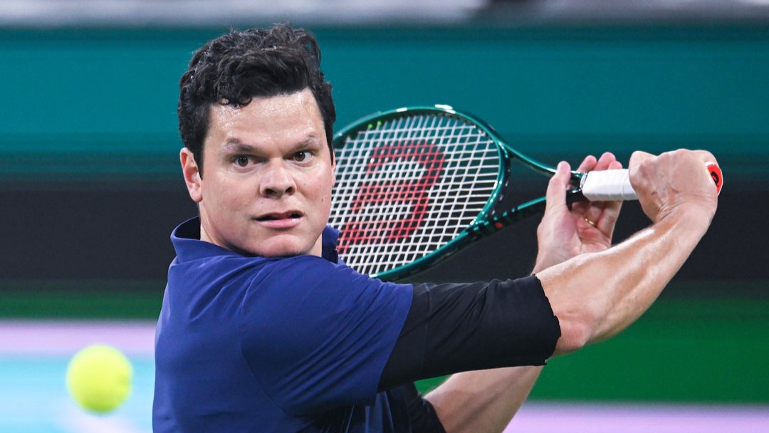 Milos Raonic winds up to hit a backhand. He is making his return to Indian Wells this week.